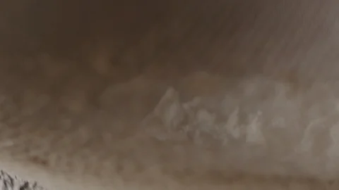 Sieving flour macro shot, isolated Stock Footage 128492683