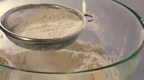 Sieving flour slow motion Stock Footage 54143112