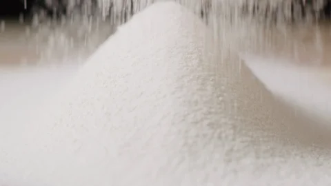 Sieving sugar powder macro shot Stock Footage 128492925