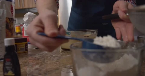 Sifter flour bowl hands kitchen Stock Footage 147299146