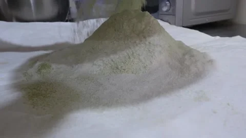 Sifting Fine Flour Onto White Surface In Commercial Kitchen Stock-Footage 345292351