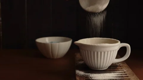 Sifting flour 2 Stock Footage 96114427