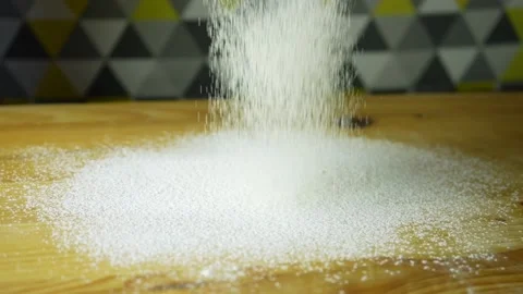 Sifting flour on a baking board. Side view Video stock 220209881