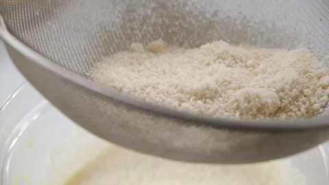 Sifting flour for baking cake and bakery. Stock Footage 123244394