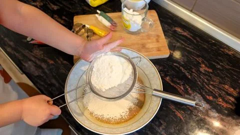 Sifting Flour Into Bowl While Making Christmas Gingerbread Cookie Dough Stock Photos