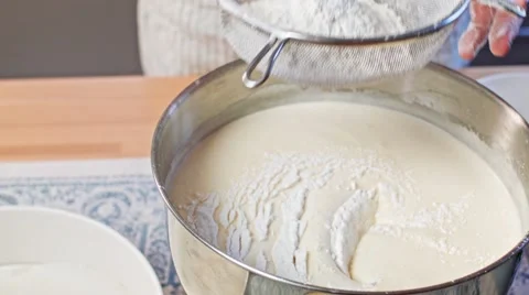 Sifting flour Stock Footage 68017094