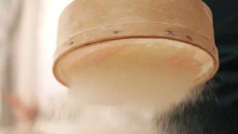 Sifting Flour Stock Footage 273501183