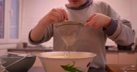 Sifting flour Stock Footage 331399644