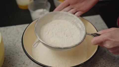 Sifting flour, making sinnabon buns. Stock Footage 166501784