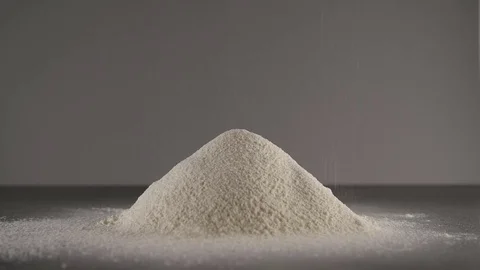 Sifting flour slow Stock Footage 84602260