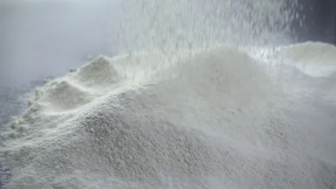 Sifting flour. Slow motion shot of wheat flour heap. Stock Footage 72245702