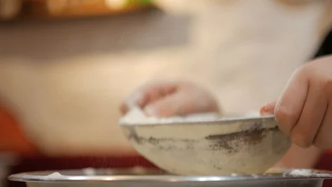 Sifting flour through sieve Stock Footage 95831205