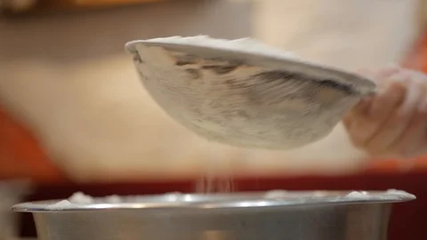 Sifting flour through sieve 스톡 동영상 95831230