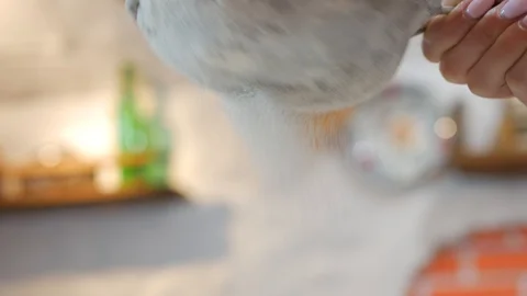 Sifting flour through sieve Stock Footage 95831268