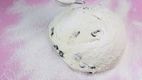 Sifting flour through a sieve over dough Stock Footage 160147862