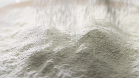 Sifting flour through sieve, slow motion Stock Footage 134644373