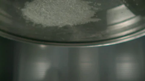 Sifting Flour Through Sieve Slowmotion Stock Footage 84059656