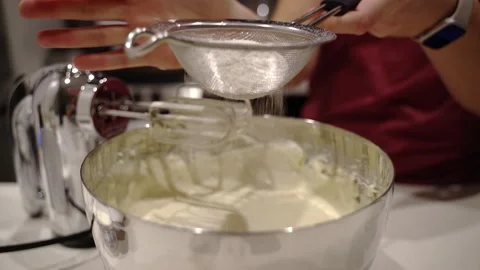 Sifting flower into pie batter Stock Footage 222166734
