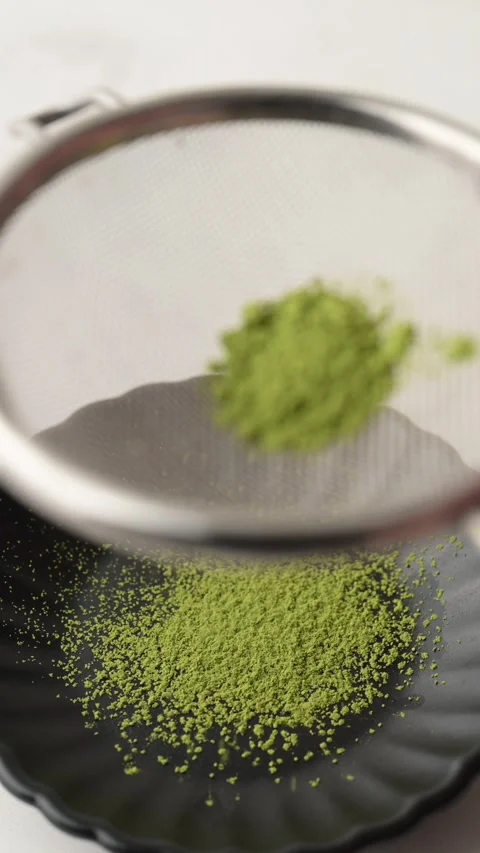 Sifting matcha with sieve Stock-Footage 270189537