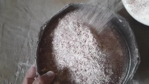 Sifting Ragi Flour with Sieve to Remove Impurities for Papad Preparation Video stock 333834514