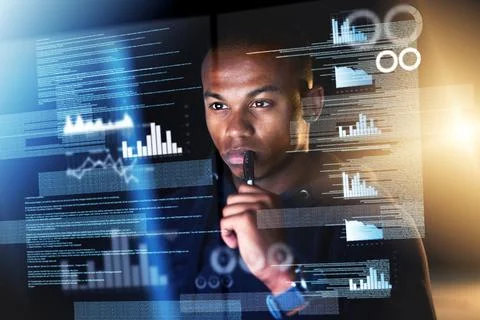 Sifting through streams of data. Cropped shot of a young male programmer sift Foto stock