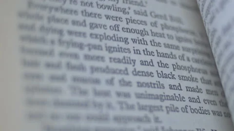 Sifting trough a book  Stock Footage 62913869