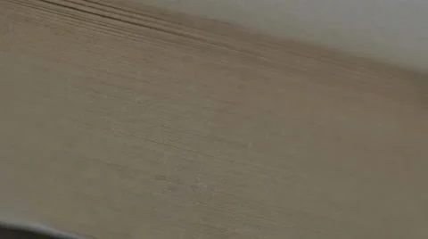 Sifting trough a book Video stock 62936415