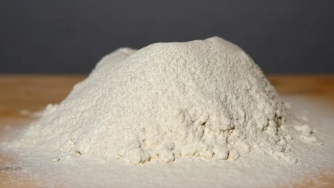 Sifting white flour powder through the sieve. Best cooking recipes Stock Footage 111028512