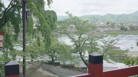 Sight seeing in Kyoto looking over river Japan 4k Vidéo 76541223