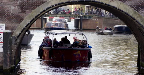 Sightseeing boat canal Amsterdam Stock Footage 56567745