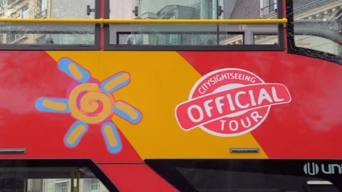 Sightseeing double-decker bus passing by. Traveling in Paris, France Stock Footage 89014894