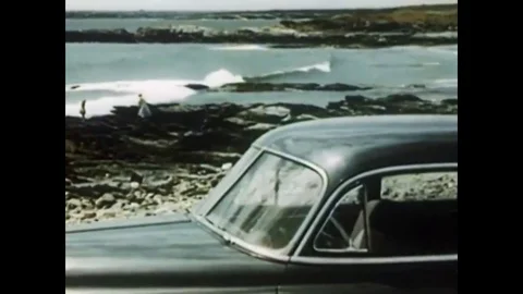 A sightseeing family driving a Chevrolet automobile visits the coastline, views Stock Footage