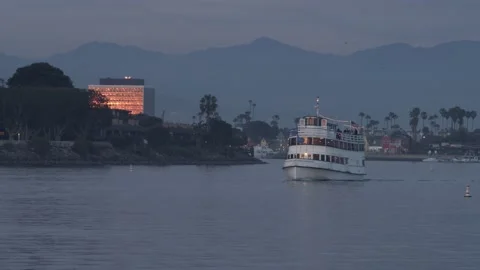 Sightseeing Ship Sailing Out To Sea At Sundown Stock Footage 171401231