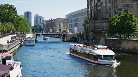 Sightseeing ships on Spree river at Museum island in Berlin Stock Footage 77148133