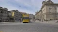 Sightseeing tour buses moving down the street in Porto 4k or 4k+ Resolution