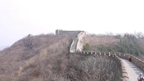 Sightseeing tourists walk on Great Wall of China Stock Footage 99585573