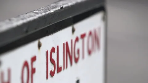 A sign in Angel, Islington in London Stock Footage
