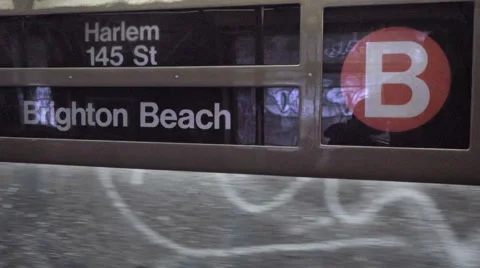 Sign for B train Harlem 145th St Brighton Beach Brooklyn moving train window NYC 库存影片 60766689