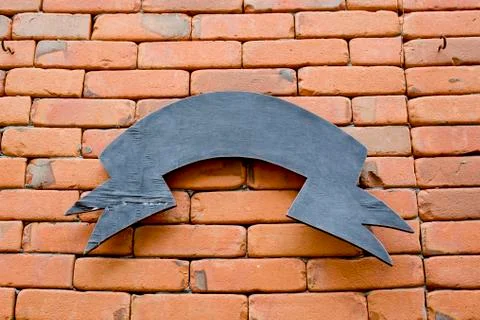 Sign on brick wall Stock Photos