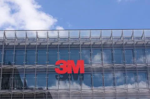 Sign on building facade with the logo of The 3M Company. Stock Photos