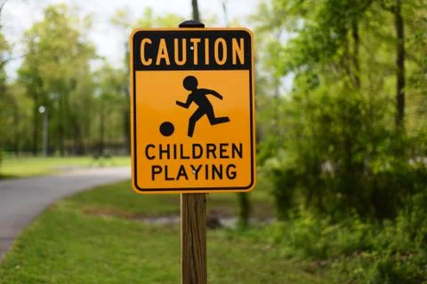Sign "Caution. Children playing" Stock Photos