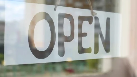 The sign is closed on the store doors. Lockdown. Video stock 128853849