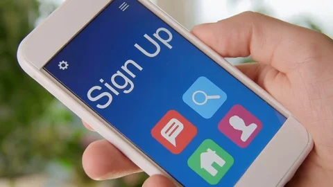 Sign up concept application on the smartphone. Man uses mobile app. 動画素材 77412917