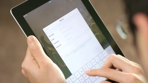 Sign up With Digital Tablet ipad Logging Stock Footage 33793035