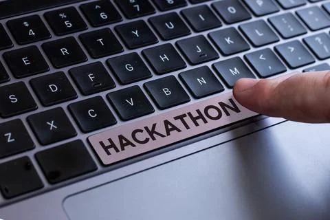 Sign displaying Hackathon. Word for event where large number of people engage in Foto stock