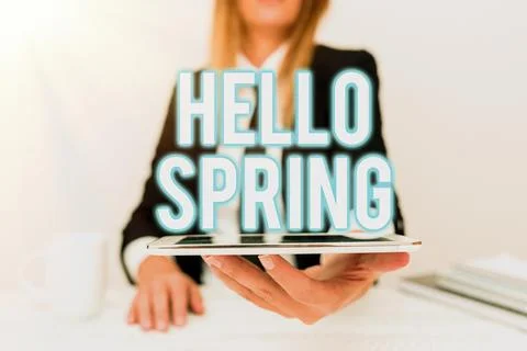 Sign displaying Hello Spring. Concept meaning Welcoming season comes after 스톡 사진