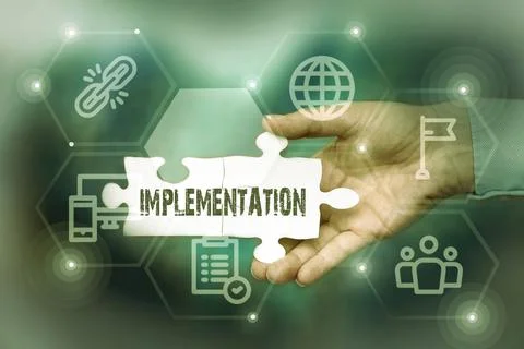 Sign displaying Implementation. Concept meaning The process of making something Stock Photos