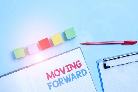 Sign displaying Moving Forward. Concept meaning Towards a Point Move on Going Stockfoto's