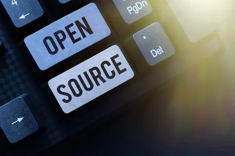 Sign displaying Open Source. Business overview contains the source code that can Stockfoto's