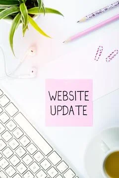 Sign displaying Website Update. Concept meaning keeping the webpage and content Stock Photos